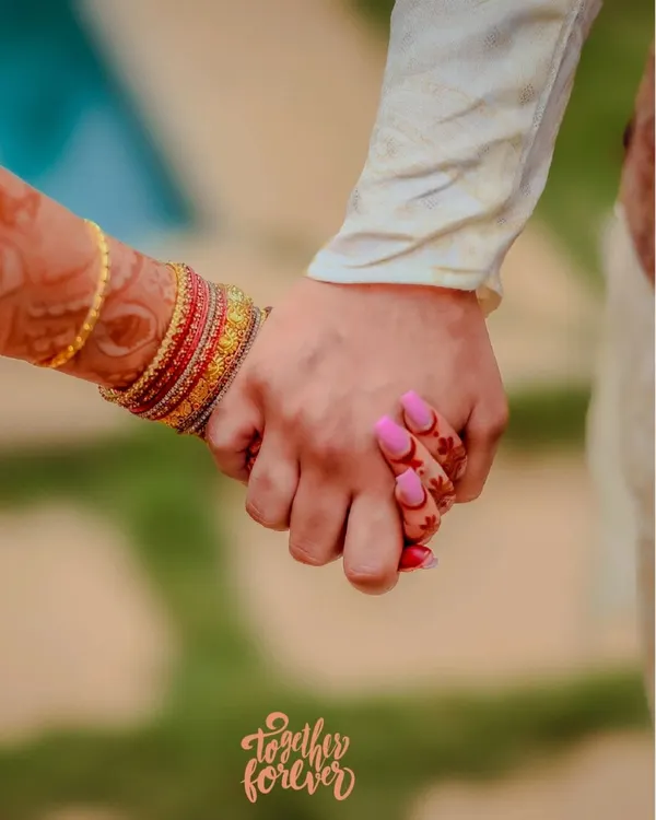 A simple, powerful image of a couple holding hands. This candid shot, with the "together forever" text, beautifully symbolizes their bond and the journey they are starting.