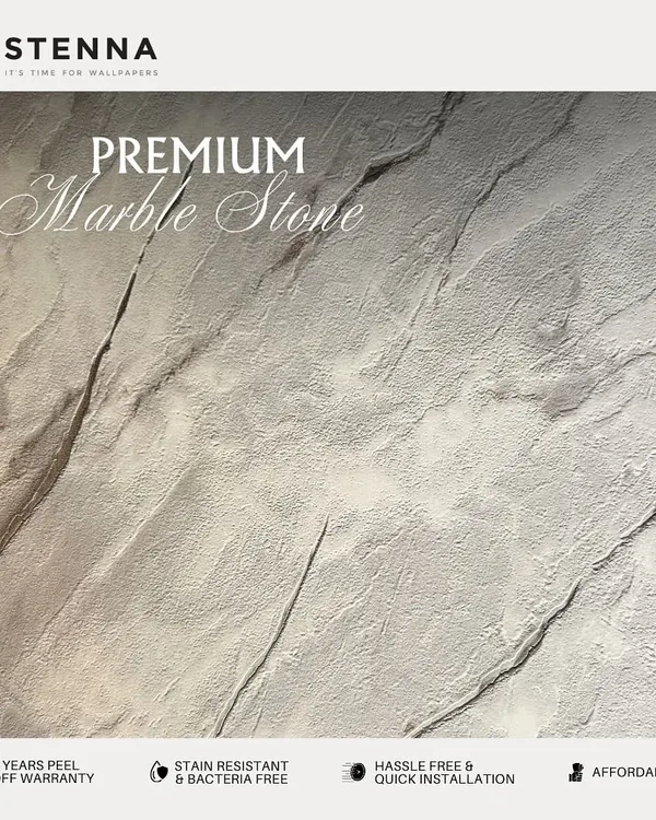 This premium marble stone wallpaper offers a sophisticated and clean look. Its subtle grey veining provides the luxurious feel of real stone, ideal for creating an elegant feature wall in a living room or entryway.