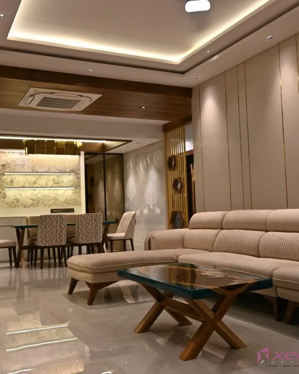 I believe in creating spaces that feel both grand and welcoming. This living and dining room project in Thane features custom furniture, layered lighting with a false ceiling, and a cohesive color palette to connect the two zones.