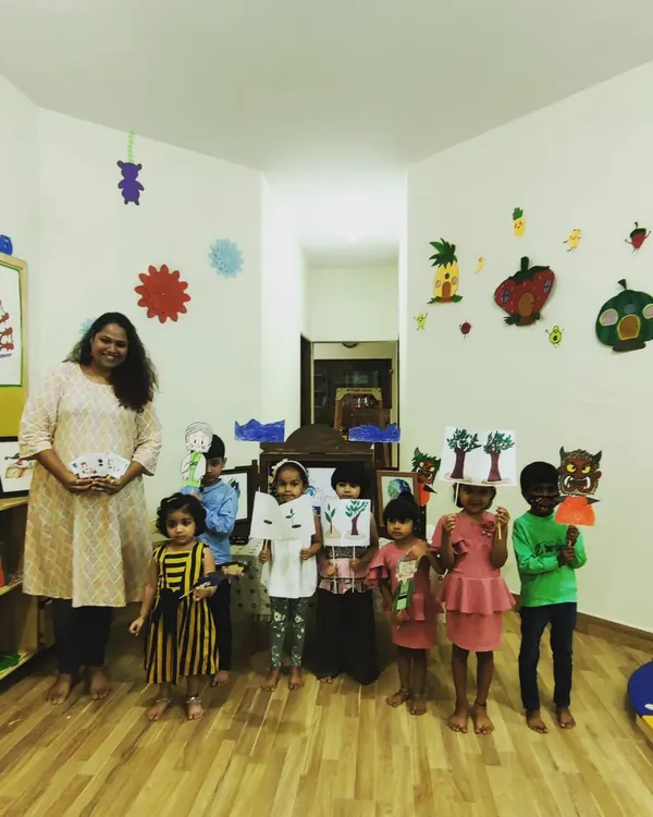 After a story about nature, the children and I pose with the character and scene props they created. This 'make and take' activity reinforces the story's themes and gives them a sense of accomplishment.