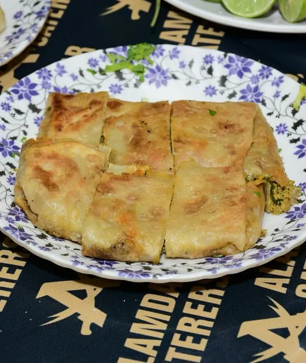 A delicious Baida Roti, quartered and ready to be served. A glimpse from Day 5 of our food festival.