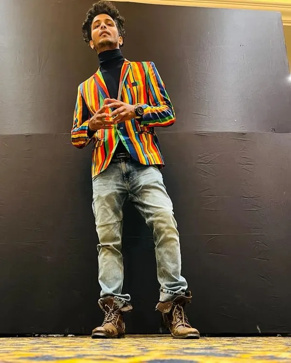 A posed shot from an event. I believe your style is an extension of your personality, and I love to bring that energy to my look.