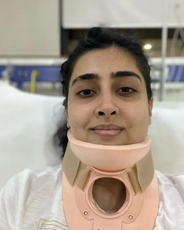 The journey of recovery often starts at a challenging point. This patient came to us after a significant neck injury that required her to wear a cervical collar. This was the beginning of her path back to full strength.