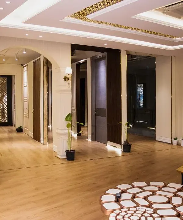 A wide view of my new showroom in Ghitorni, Delhi. It's a one-stop destination for architects and homeowners, showcasing everything from designer doors and modular kitchens to texture veneers and flooring.