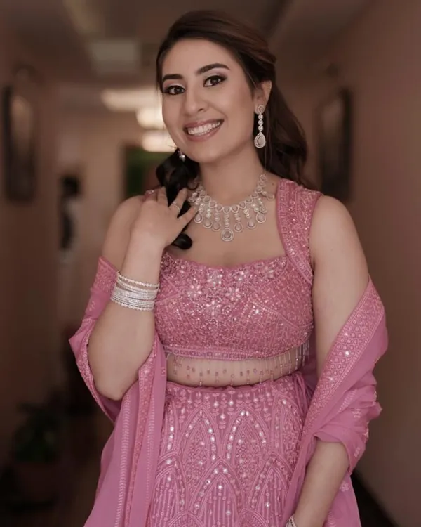 Divya looking stunning for her Sangeet ceremony in this beautiful pink lehenga. We created a soft, romantic makeup look with glowing skin and a simple hairstyle to let her and her outfit be the stars of the show.