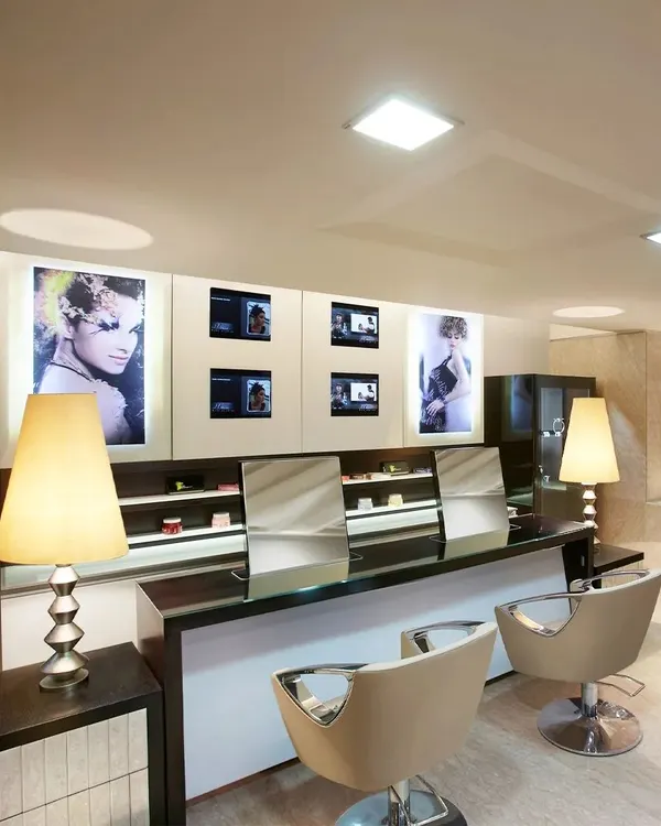 Our styling stations are designed for both function and luxury. With clean lines, professional lighting, and comfortable seating, this is where our stylists craft your personalized look.