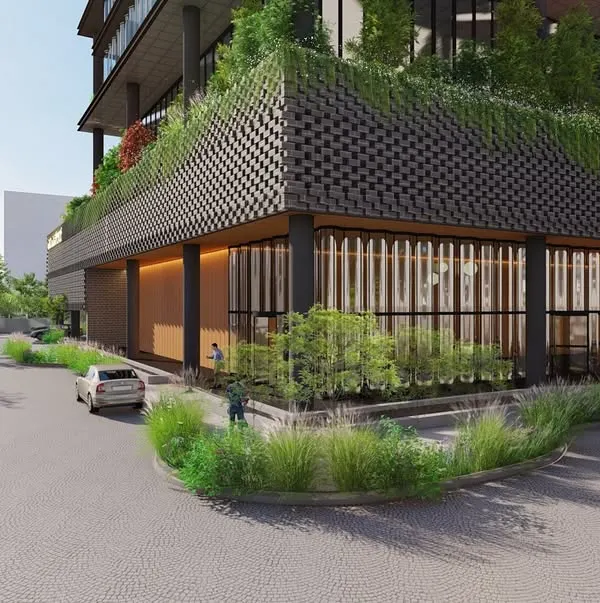 The entrance to the MSR Tower is designed to be welcoming, with a landscaped drop-off area and a transparent ground floor that connects the building to the street.