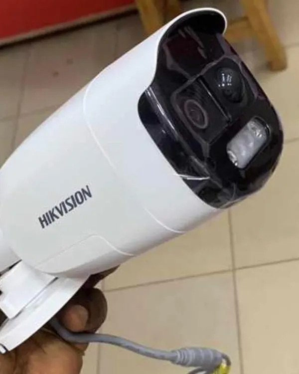A close-up of a Hikvision bullet camera. This is a powerful and reliable choice for outdoor security.