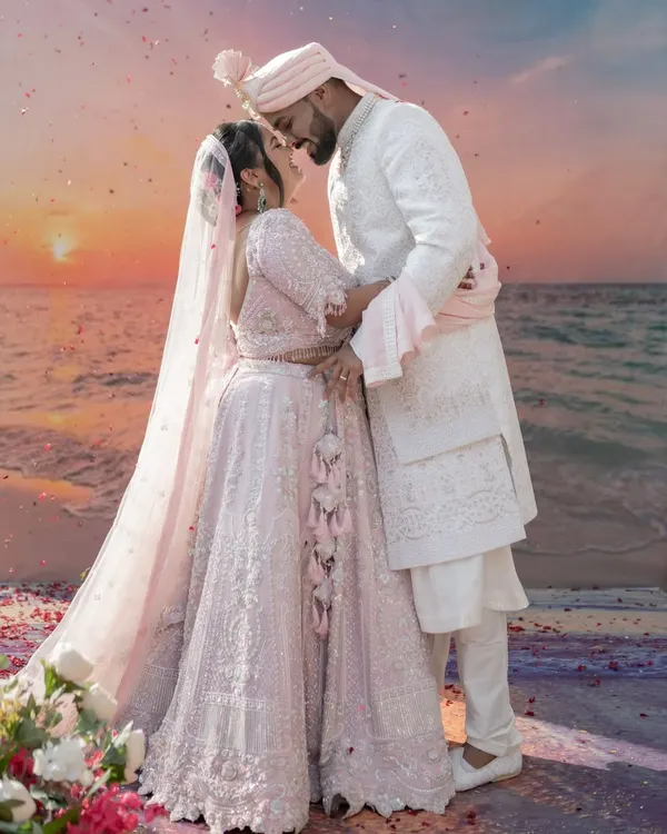 A romantic embrace as the sun sets over the ocean. We believe in creating epic, breathtaking portraits that feel like a scene from a movie, capturing the magic of your love story against a stunning backdrop.