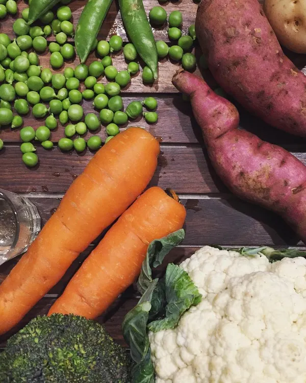 A rainbow of fresh veggies ready for this week's meals. I believe dogs can taste the freshness of real ingredients like sweet potatoes, carrots, peas, and broccoli.