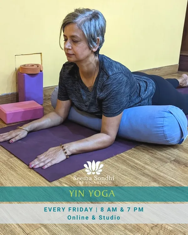 My Yin Yoga classes are a journey into deep connective tissues. We hold poses like this supported Sphinx pose for longer periods to connect mind, body, and breath.