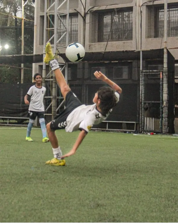 We believe in nurturing talent and encouraging players to express themselves. This incredible bicycle kick during a training session shows the kind of confidence and skill we build in our advanced youth programs.