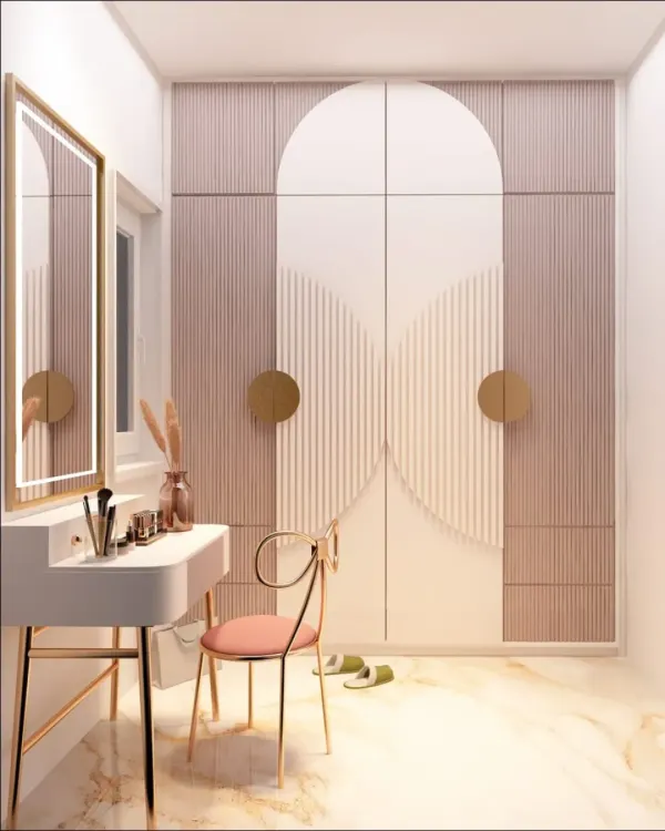 A dressing room should feel like your personal sanctuary. This space combines soft lighting, elegant textures, and artistic wardrobe doors to create a corner where style and confidence begin.