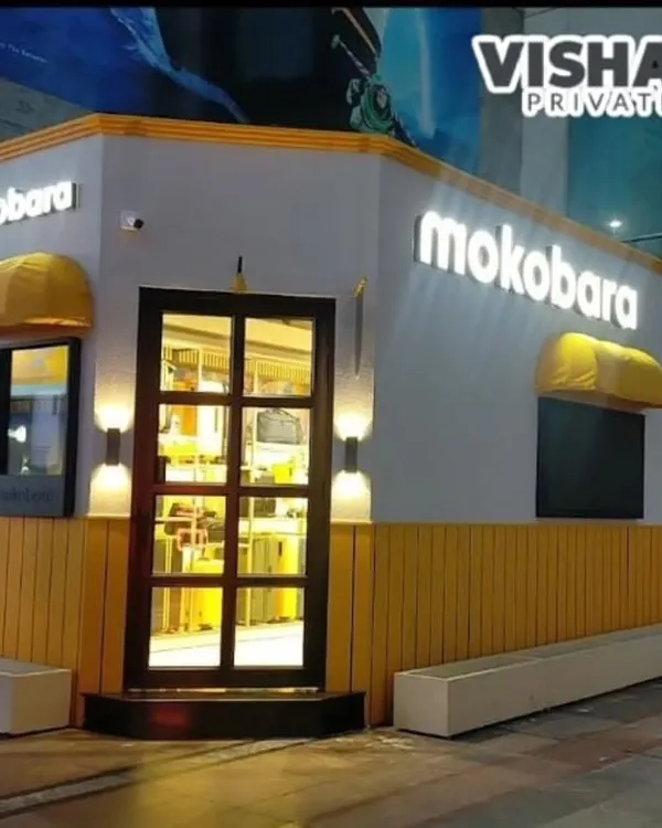 This is a high-end pop-up store I built for the luxury brand Mokobara in Gurugram. The design features prominent 3D backlit branding, warm exterior lighting, and large glass panels to create an inviting, premium retail experience right out of the box.