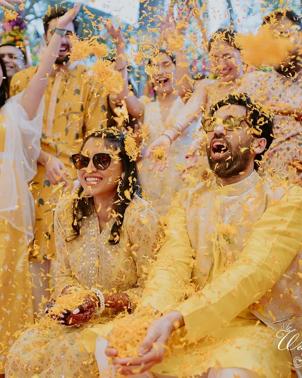 There's nothing like the pure joy of a 'phoolon ki haldi'. I love creating these moments where the couple is showered with love and flower petals by their friends and family.