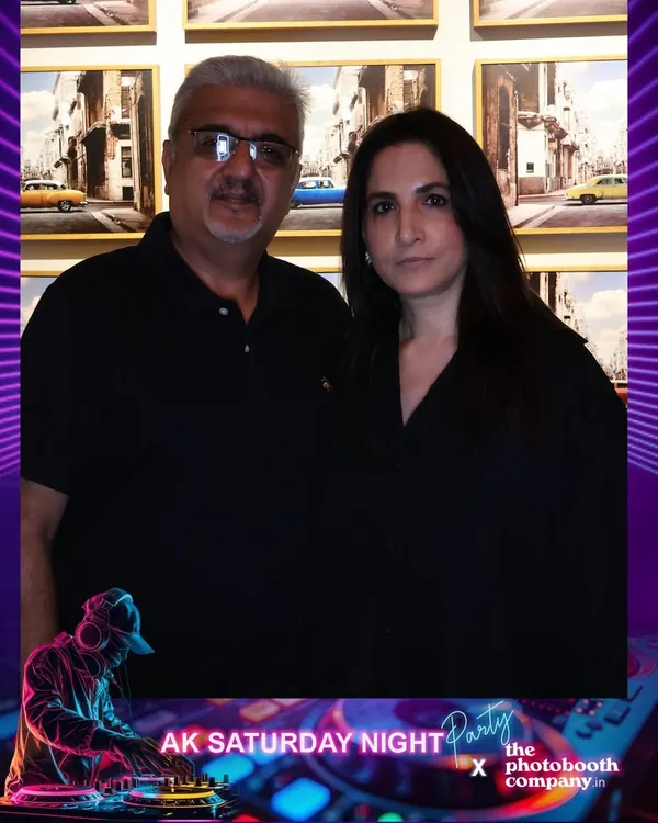 Kicking off the 'AK Saturday Night Party' at The Quorum Club. Our booth, with its custom DJ-themed overlay, set the tone for a night of drinks, beats, and great memories.