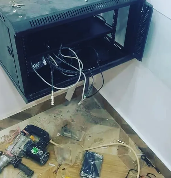 This is a look at the start of a DVR rack installation. I handle all the drilling and mounting myself to create a secure, centralized hub for your entire surveillance system.