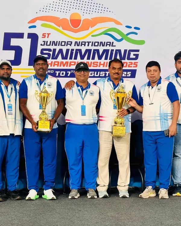 Our team of champion coaches with their trophies at the 51st Junior Nationals.