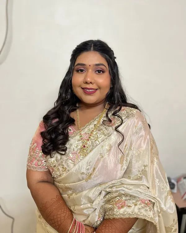 This is the same beautiful client from my featured section. This image shows her looking straight on, showcasing the flawless, authentic finish of her makeup. No edits, just her natural beauty enhanced.