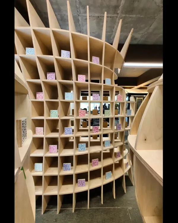 Our installation, 'Stradata', is a structure conceived through iterative computation. Made of birch ply, its plastic form is derived from code and data, exploring whether architecture can be immersive and meaningful even in its fragmented parts.