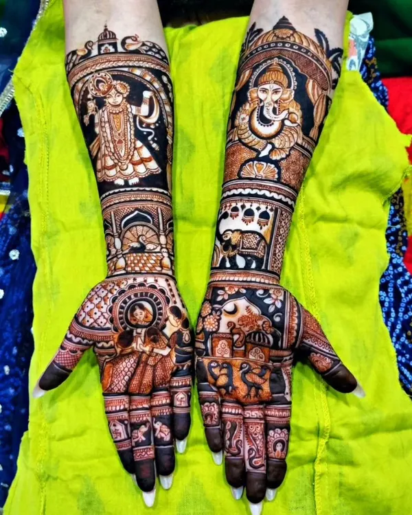 A divine masterpiece for a bride's new beginning. This design features detailed portraits of Radha-Krishna on one arm and Lord Ganesha on the other, surrounded by intricate traditional patterns.
