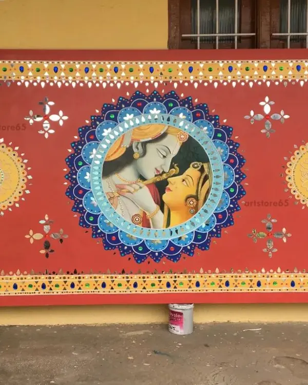 The completed Radha-Krishna panel, ready for installation. This large-scale piece combines painting with traditional Lippan craft, showcasing our ability to execute complex, customized figurative art for our clients.