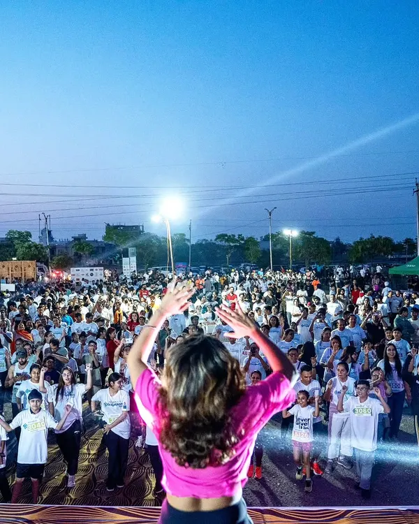 This is the view from our stage. We love connecting with and energizing massive crowds, turning any corporate event into an unforgettable fitness celebration.