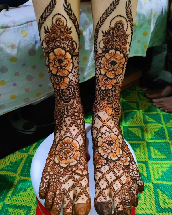 A classic bridal feet design featuring large floral motifs and detailed patterns covering the entire foot.