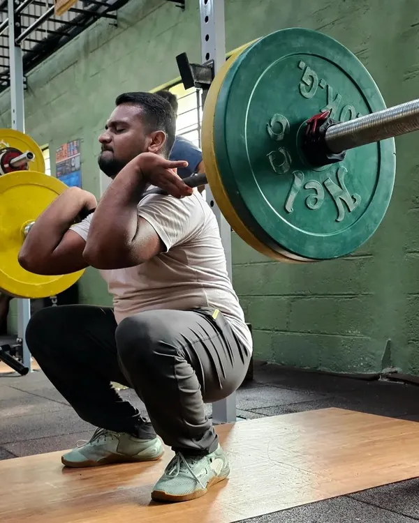 Excellent mobility is the foundation of true strength. Here, one of our members demonstrates a deep front squat, showcasing the flexibility and control we drill into every athlete. This is what proper form looks like.