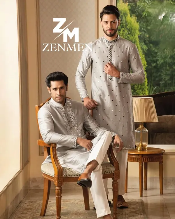 A showcase of my finely detailed grey kurta sets. The one on the left features heavy mirror work on the placket, while the one on the right has a more scattered, subtle pattern.