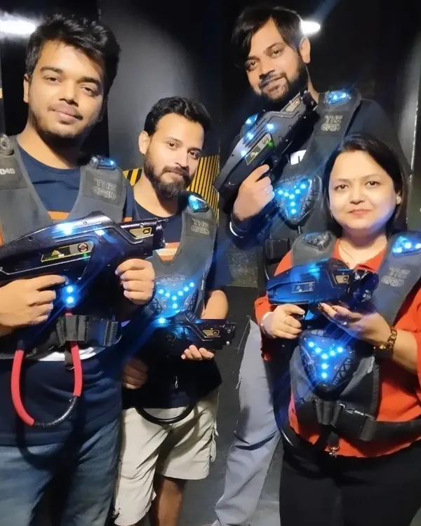 This squad came ready to play. Geared up in our laser tag vests, they're about to enter the arena for some friendly competition.