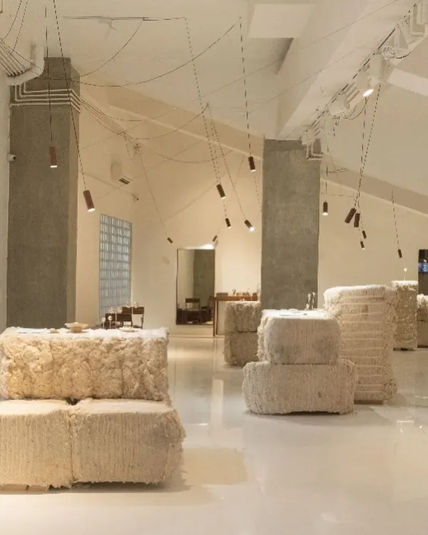 The exhibition landscape we designed for Studio Renn's fine jewelry collection. We used bales of raw kala cotton to create pedestals and partitions, creating a soft, primal environment that contrasts with the precious, formed jewelry.