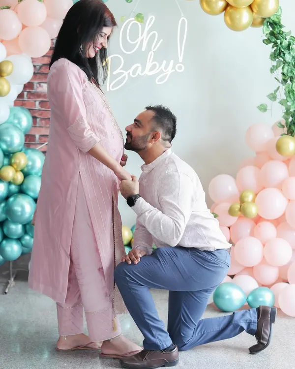 A classic, heartfelt pose during a maternity and baby shower event. I help couples feel comfortable so we can capture beautiful, intimate photos like this one.