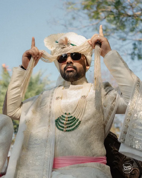 Vibe check: 100 percent baraat madness! Capturing the groom's energy and style as he makes his way to the wedding.