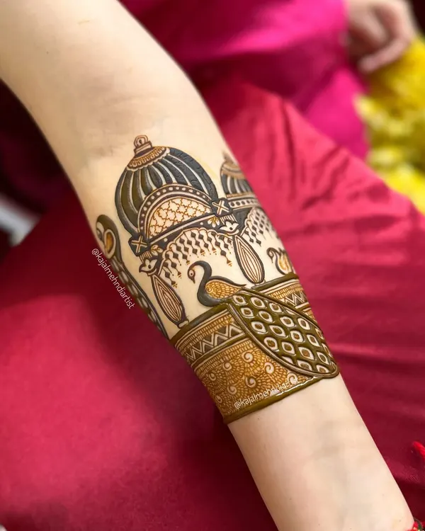 A beautiful and elegant armband design, featuring a palace dome and a peacock. Perfect for a guest or bridesmaid who wants something unique.