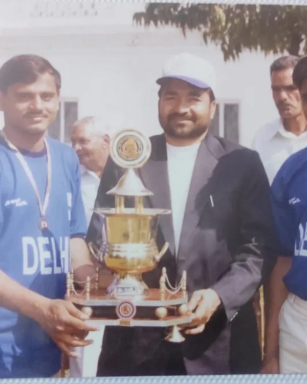 A throwback photo of my Guru ji and our team with a championship trophy. His teachings are the reason for our success today.