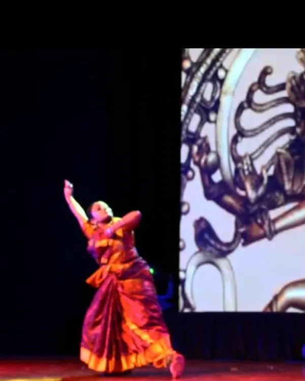 A powerful moment from a classical stage performance. Dressed in traditional attire, this pose captures the essence of Bharathanatyam, where every movement tells a story. We guide our students to master both the form and the expression.