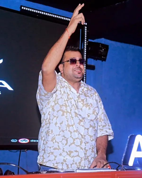 Getting the crowd hyped during a Saturday night set at Aura Night Club. My goal is always to see hands in the air.
