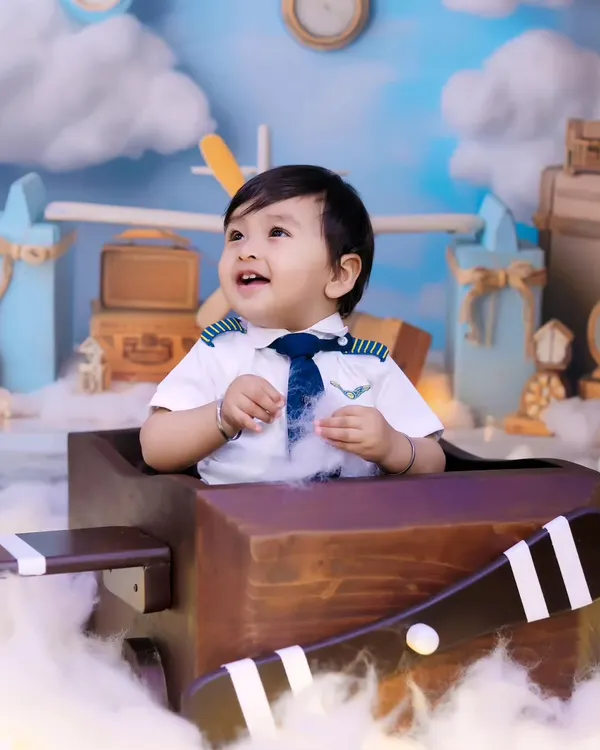 We love bringing creative ideas to life, like this little pilot photoshoot. Our studio is equipped with unique props to make your child's session a memorable adventure.