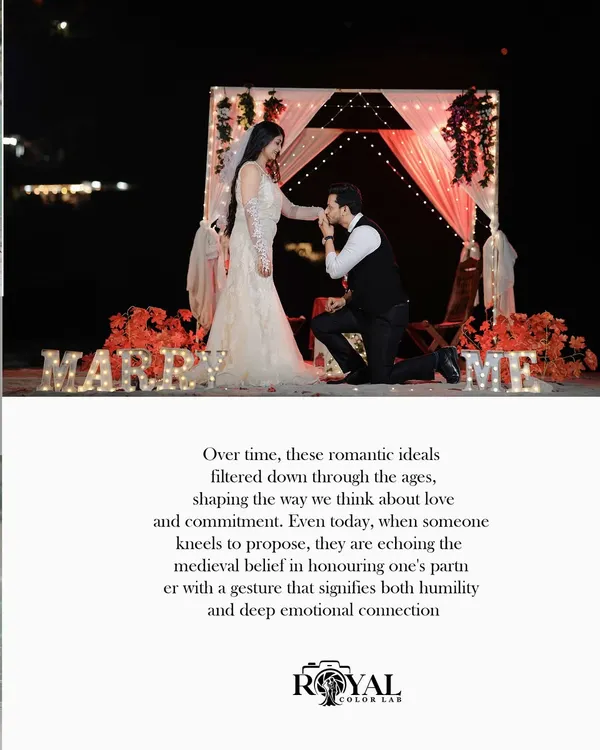 A classic proposal scene at night, with the groom-to-be on one knee and illuminated "MARRY ME" letters creating a magical ambiance.