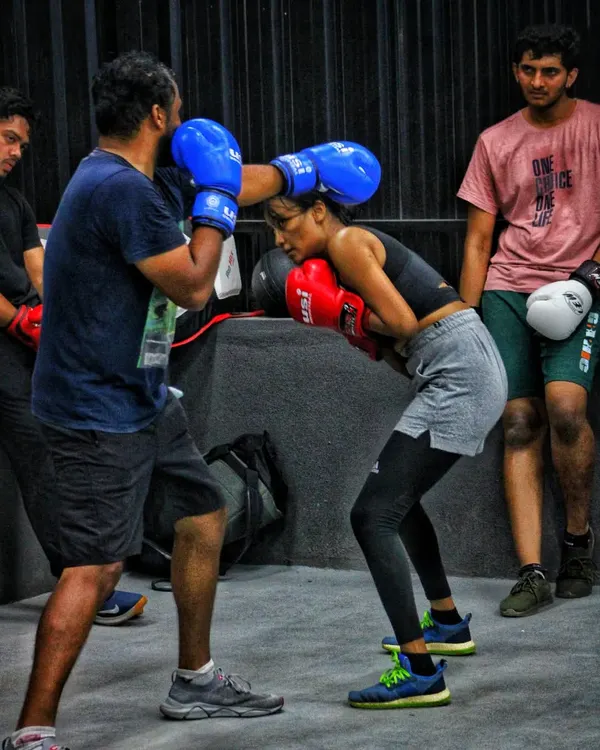 A perfect example of a body shot drill in a live sparring context. This teaches you to find openings and attack the body, a key skill in boxing.