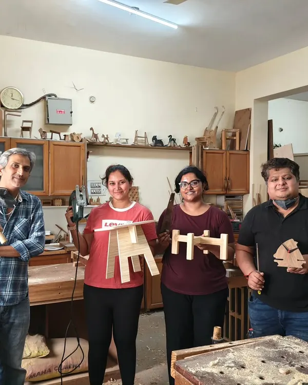 A great weekend group holding their finished projects. We made everything from small stools and planter stands to boxes. It's amazing to see what you can create in just a couple of days.