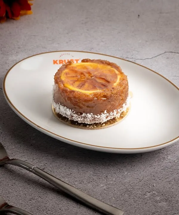 My vegan Orange Ginger cake, a plant-based version of our signature tea cake. It's just as moist, fragrant, and delicious, I pinky promise.