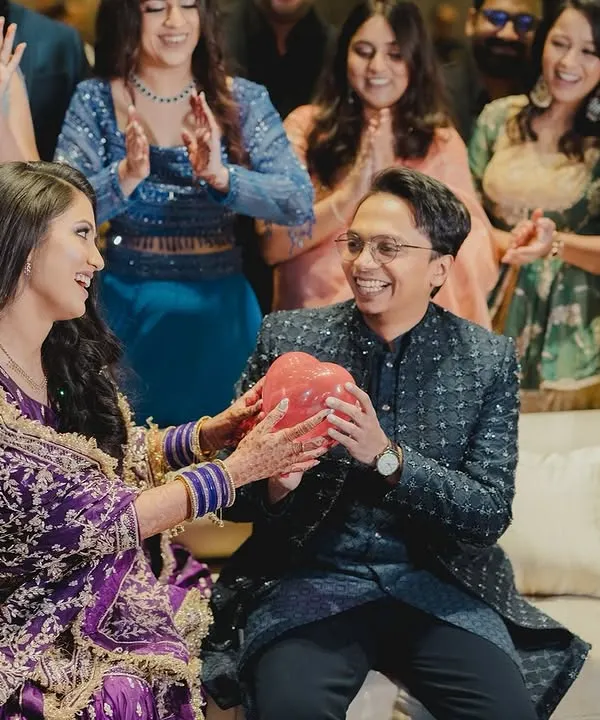 This is what it's all about. Pure joy and laughter during the shoe game. I love creating these moments where the couple can just relax and have a blast, while their friends and family cheer them on.