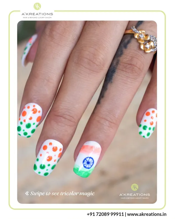 A creative take on patriotic nail art, this design features the Indian flag colors in a fun polka dot pattern alongside a painted flag accent nail.