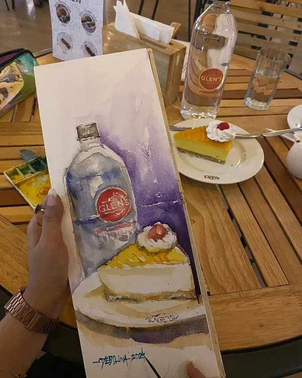 A watercolor sketch of my favorite mango cheesecake from Glen's Bakehouse. What better way to spend a holiday than enjoying a delicious dessert and painting it too?