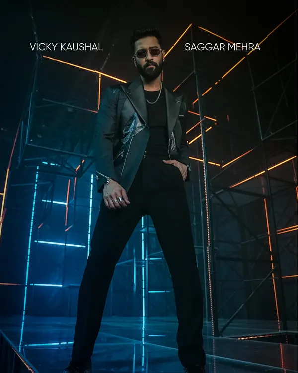 This is where power and poetry meet. I designed this bespoke leather jacket for Vicky Kaushal for the "Tauba Tauba" music video, focusing on a sharp, commanding silhouette with modern zipper details. It’s a look that embodies a confident, edgy energy.