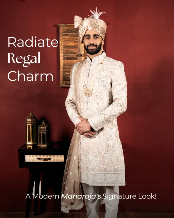 This is not just a sherwani; it’s a crown you wear with pride. I designed this piece for the modern Maharaja, combining intricate all-over embroidery with a timeless ivory silhouette. It’s a signature look that radiates regal charm for your most important day.