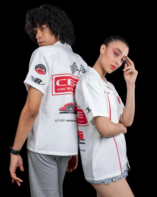 A back-to-back pose for Cerise Clothing, showing off the detailed graphics on their racing-themed shirts. This shot captures the brand's streetwear aesthetic for both men and women.