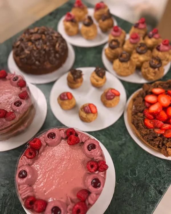 A table full of happiness. This spread for Mother's Day included my raspberry cakes, a strawberry tart, and an assortment of choux pastries. It's my happy place.